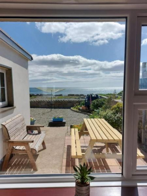 The Beach House Annalong Cosy beachview cottage